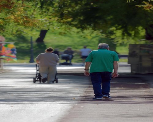 elderly people active lifestyle walking in park